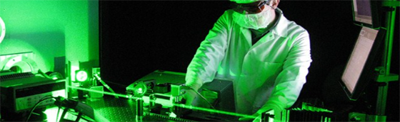 man working with laser